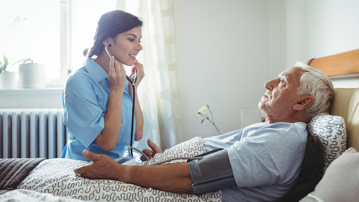nurse taking care of a resident