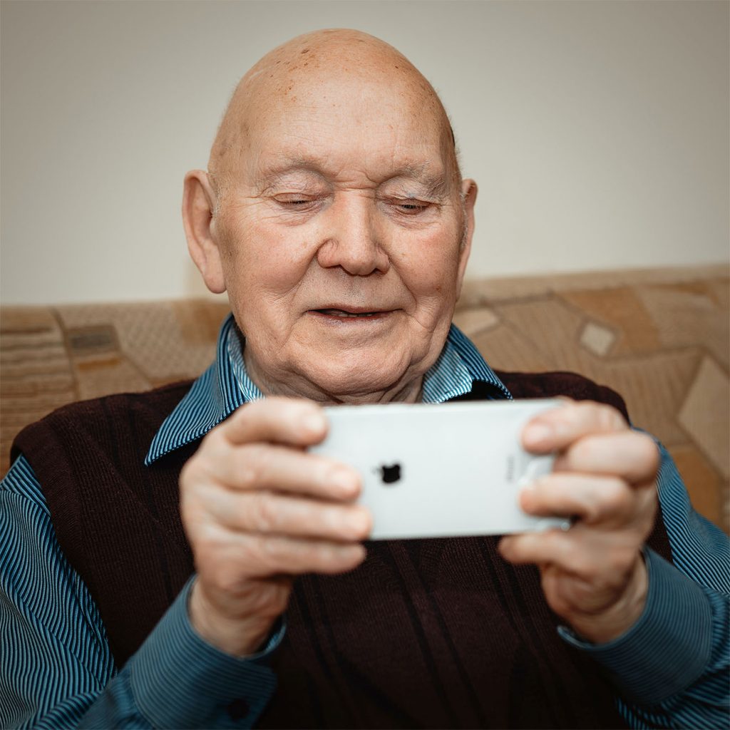 resident holding a phone